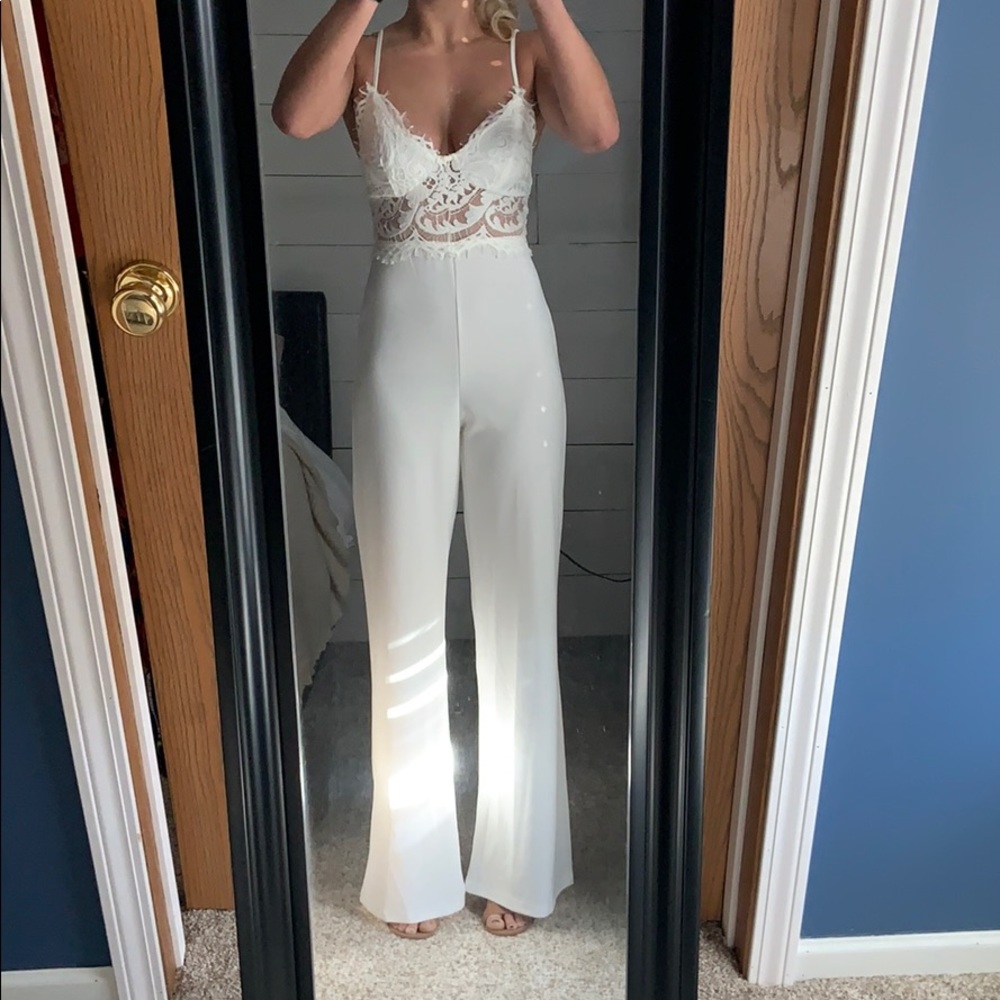Fashion Nova white lacy jumpsuit w/ wide l…